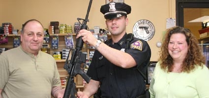 Sporting good store donates rifle to NPD