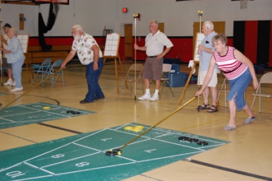 Local couples team up to form shuffleboard club
