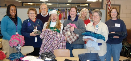 Delivering Christmas: NCSD, The Place’s Holiday Clothing Drive