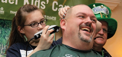 St. Baldrick’s Foundation shaving heads, raising money for a good cause