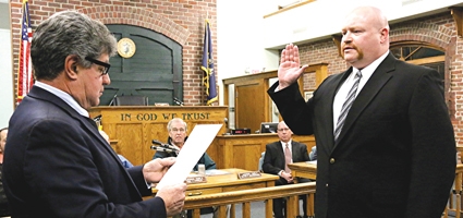 Incoming police chief sworn in at 2015 organizational meeting