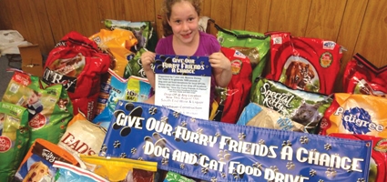 7-year-old donates nearly 2,000 pounds of dog and cat food to local animal shelters