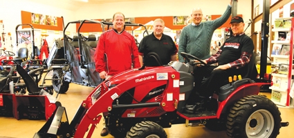 New Berlin man enters contest, wins Mahindra tractor