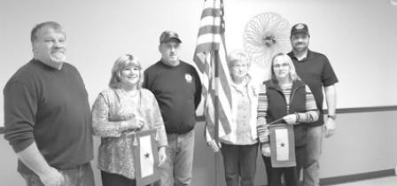 Norwich American Legion Auxiliary  presents blue star flags to local families