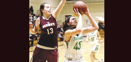 Lady Trojans slam Sidney for first round sectional win