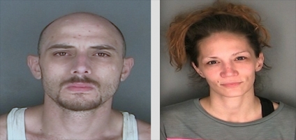 Two arrested on charges of selling heroin