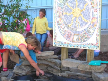 Children at The Place learn the value of community service