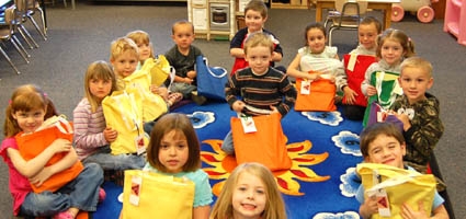 S-E prepares bags to help children prepare for school