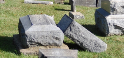 Two plead guilty in cemetery vandalism