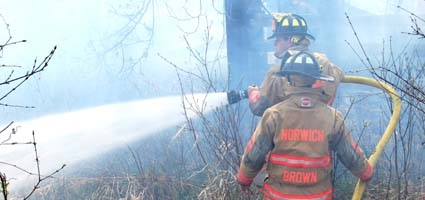 Norwich Firefighters Battle Brush Fire