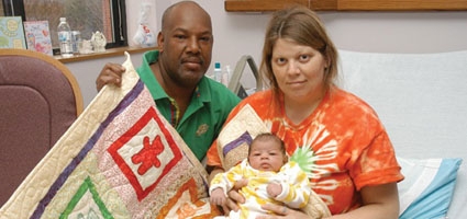 Quilt Guild honors baby born on National Quilting Day