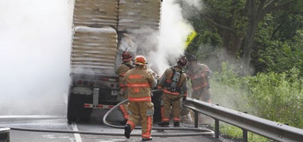 Tractor trailer hauling wood stove pellets catches fire on Rt. 12