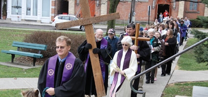 Palm Sunday procession winds through Norwich