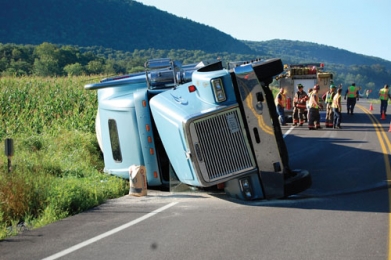 Overturned truck blocks one lane of Route 8 in Town of Norwich