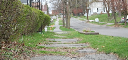 City renews sidewalk replacement, paint rebate incentives