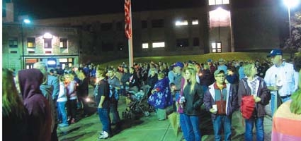 Candlelight vigil helps S-E deal with former principal’s death