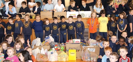 Holy Family does its part for holiday food drive