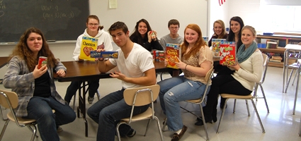 Oxford Honor Society Prepares For Basketball Game Food Drives