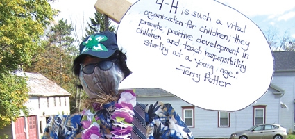 Storm Family 4-H Club in New Berlin create scarecrows in honor of local business people