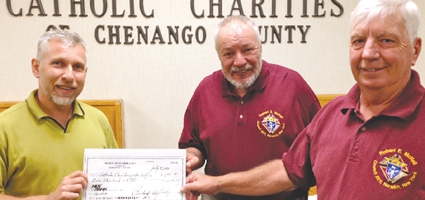 Catholic Charities Receives Donation From K Of C