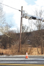 Oxford MVA yields broken  utility pole, slows Rt. 12