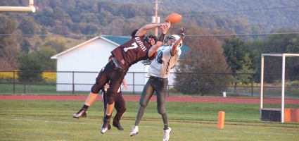 Hull runs for four TDs as Marauders rout the visiting Wildcats 