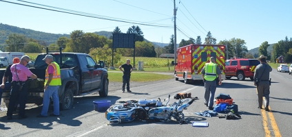 Motorcycle versus pick-up truck in Town of Norwich Monday