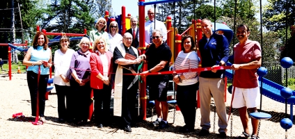 It takes a community: Holy Family opens new playground