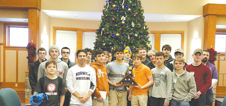 Norwich Wrestling team brings holiday cheer to Oxford veterans