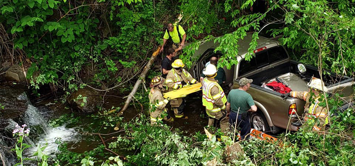 Volunteers Rescue Person Who Accidentally Drove Into River