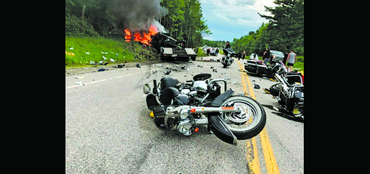 Truck driver charged with 7 homicides in motorcycle crash