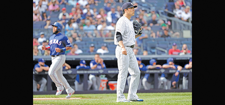 Yanks' streak without shutout ended at 220 by Minor, Rangers