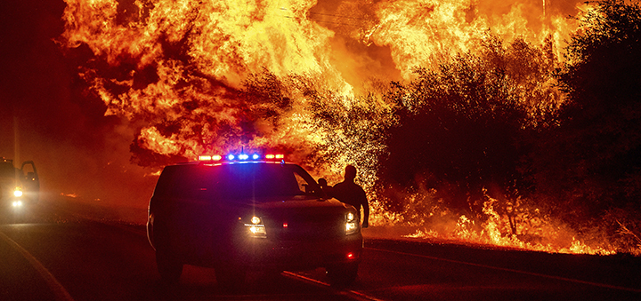 California fire that killed 3 threatens thousands of homes