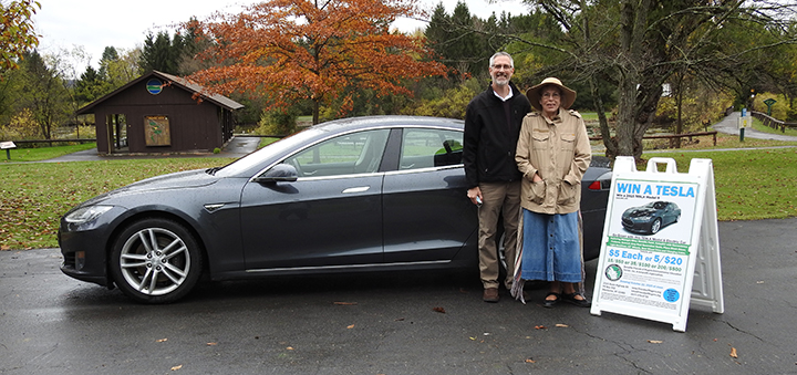 Friends of Rogers electric car raffle winner picks up their new Tesla